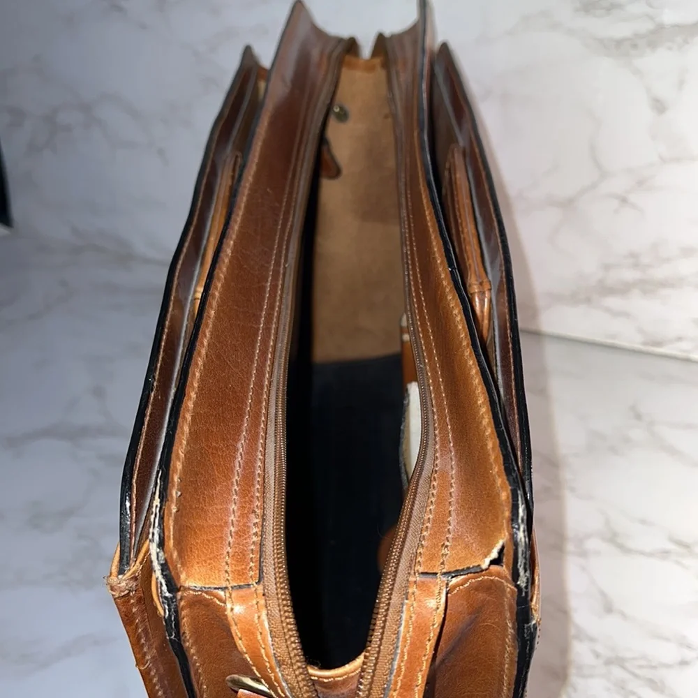 Hey JR Wants This Awesome Leather Briefcase! Very Smart with Slide Down Handels
